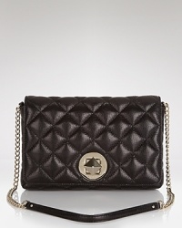 This kate spade new york shoulder bag blends practical allure with on-trend panache, crafted in leather and finished with classic, turnlock hardware. This kate spade new york shoulder bag blends practical allure with on-trend panache, crafted in leather and finished with classic, turnlock hardware.