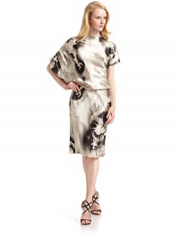 THE LOOKAbstract printPullover styleDraped neckline One short dolman sleeve; one pleated short sleeveBlouson bodiceElastic waistTHE FITAbout 48 longTHE MATERIALSilkCARE & ORIGINDry cleanImportedModel shown is 5'10 (177cm) wearing US size Small. THE LOOKAbstract printPullover styleDraped neckline One short dolman sleeve; one pleated short sleeveBlouson bodiceElastic waistTHE FITAbout 48 longTHE MATERIALSilkCARE & ORIGINDry cleanImportedModel shown is 5'10 (177cm) wearing US size Small.