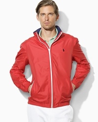Designed for modern versatility and comfort from sleek water-resistant microfiber, the Merion windbreaker is a handsome guard against the elements with a stowable hood and heavy-duty zipped front. Designed for modern versatility and comfort from sleek water-resistant microfiber, the Merion windbreaker is a handsome guard against the elements with a stowable hood and heavy-duty zipped front.