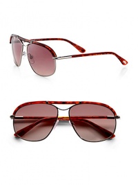 Classic navigator frames crafted in lightweight metal and acetate with brow bar and tubular temples. Available in rose with gradient rose lens or black with gradient grey lens.Signature Tom Ford tubular temples100% UV protectionMade in Italy Classic navigator frames crafted in lightweight metal and acetate with brow bar and tubular temples. Available in rose with gradient rose lens or black with gradient grey lens.Signature Tom Ford tubular temples100% UV protectionMade in Italy