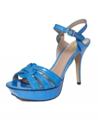 Prepare to flaunt the perfect pedicure. Resort-ready and exotic, Vince Camuto's Toleo platform sandals instantly infuse your look with a vivacious color, sultry straps and a heel that turns heads. Prepare to flaunt the perfect pedicure. Resort-ready and exotic, Vince Camuto's Toleo platform sandals instantly infuse your look with a vivacious color, sultry straps and a heel that turns heads.