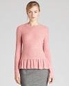 With separates dominating our wardrobes this season, this REISS sweater makes a statement with a fluttering peplum hem. Toughen the demure silhouette with a sleek pencil skirt for feminine sophistication.