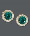 Put the green in your glamour. Effy Collection's dazzling button stud earrings feature round-cut emeralds (3/4 ct. t.w.) surrounded by halos of round-cut diamonds (1/8 ct. t.w.). Crafted in a 14k gold post setting. Approximate diameter: 1/4 inch.