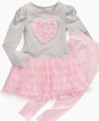She'll love twirling in this adorable tutu dress with legging set from Flapdoodles featuring pretty rosettes. She'll love twirling in this adorable tutu dress with legging set from Flapdoodles featuring pretty rosettes.