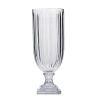 This hand-cut glass vase boasts a unique square base and exudes a vintage feel.