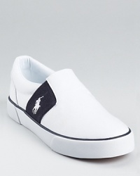A stylish, sleek summertime option, this handsome slip on from Ralph Lauren Childrenswear is crafted in canvas with a matching rubber sole and contrasting panels at the sides. A stylish, sleek summertime option, this handsome slip on from Ralph Lauren Childrenswear is crafted in canvas with a matching rubber sole and contrasting panels at the sides.