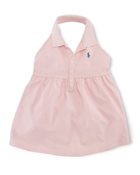 The classic cotton-mesh polo is given a pretty warm-weather look in a sleeveless halter silhouette with smocked detailing. The classic cotton-mesh polo is given a pretty warm-weather look in a sleeveless halter silhouette with smocked detailing.