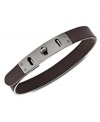 A handsome wrist wrap from Fossil. With a thin design, this leather bracelet showcases a brushed steel accent with turnlock closure. Crafted in gray leather. Approximate length: 9-1/4 inches.