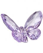 Dazzling in the wings. This bejeweled butterfly reflects the light beautifully with faceted violet wings edged in glittering crystal dots. A special figurine from Swarovksi.