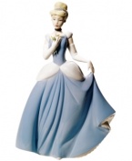 Play fairy godmother. A princess-in-the-making or dedicated Disney collector will revel in Cinderella's delicate true-to-life features, realized in fine porcelain by Nao by Lladro.