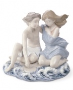 Get nostalgic with the sweet and dreamy Summer Crush figurine by Lladro. A young boy carves a heart in the sand beside his one and only in beautiful glazed porcelain.