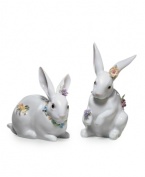 Some bunny to love. Wearing a necklace of spring blooms, this white porcelain rabbit from Lladro is a must for Easter but a sweet fixture in your home year-round.