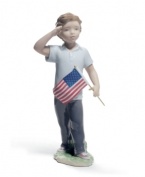 Get a little patriotic. An all-American boy honors the stars and stripes in this delicately handcrafted Saluting the Flag figurine by Lladro.