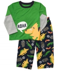 Send him off to have a roaring good time in his dreams in this fun dinosaur shirt and pant sleepwear set from Carter's. Send him off to have a roaring good time in his dreams in this fun dinosaur shirt and pant sleepwear set from Carter's.