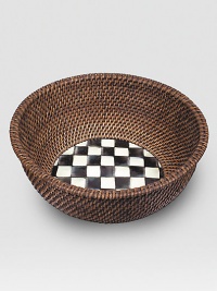 An inviting mix of handwoven, natural rattan and glazed enamelware, handpainted with high-contrast checks and subtle jeweltones. Enamelware backed in lightweight, lasting steel Bronzed stainless steel rim 5¾H X 12 diam. Imported