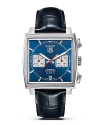 In 1969, TAG Heuer broke with tradition by creating the first square-cased, water-resistant watch in the history of watchmaking. Powered by the famous Chronomatic Calibre 11, the Monaco is also the world's first automatic chronograph. With blue dial and a polished steel bezel. Features a date window.