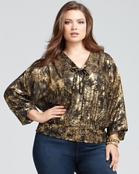 In lieu of sequins, don this MICHAEL Michael Kors tie neck blouse with a burnished golden finish to your next party for subdued, shimmering style. In lieu of sequins, don this MICHAEL Michael Kors tie neck blouse with a burnished golden finish to your next party for subdued, shimmering style.