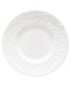 An elegant white-on-white pattern featuring an embossed vine motif and interior glaze lends the Opal Innocence Carved party plate to refined dining every day.