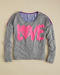 She'll love the bold contrast of a graffiti-print front panel and the multistripe back panel, each accented with bursts of neon. She'll love the bold contrast of a graffiti-print front panel and the multistripe back panel, each accented with bursts of neon.