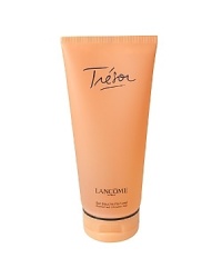 Romantic. Sensual. Emotional. The elegance of rose, muguet and lilac. The sparkle of apricot blossom. A glorious golden coral, so every drop opens like petals on the skin. Experience this rich-foaming body gel that cleanses gently and beautifully. Leaves skin with a delicate aura of TRÉSOR. Romantic. Sensual. Emotional. The elegance of rose, muguet and lilac. The sparkle of apricot blossom. A glorious golden coral, so every drop opens like petals on the skin. Experience this rich-foaming body gel that cleanses gently and beautifully. Leaves skin with a delicate aura of TRÉSOR.