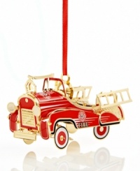 Steer this blazing red fire truck into your tree. Handcrafted in solid brass with gold rims and ladders, it's an authentic replica of the classic vehicle. From Baldwin. Steer this blazing red fire truck into your tree. Handcrafted in solid brass with gold rims and ladders, it's an authentic replica of the classic vehicle. From Baldwin.