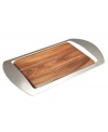 Style is served. Clean lines and modern materials give the Mikko bar tray an air of cool sophistication. Handsome acacia wood is set in polished metal with sculpted handles for easy entertaining. Designed by Neil Cohen for Nambe.