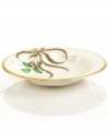 A mixture of Lenox's Holiday holly motif and their classic Christmas plaid ribbon creates an elegant design upon this deep rim soup bowl from the holiday dinnerware and dishes collection. Scrolling accents and a rim of 24-karat gold finish the look with lasting grace.