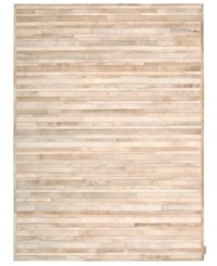 Western chic. Invite sumptuous style into your home with the one-of-a-kind Prairie rug from Calvin Klein. Tonal bars of rich cowhide are hand-tufted in an alternating pattern to create a stunning, mosaic-like appearance and a divinely textured feel. Western chic. Invite sumptuous style into your home with the one-of-a-kind Prairie rug from Calvin Klein. Tonal bars of rich cowhide are hand-tufted in an alternating pattern to create a stunning, mosaic-like appearance and a divinely textured feel.