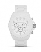 Be a good sport: This boldly colored silicone watch from MICHAEL Michael Kors is a high-impact accessory, featuring an over sized bezel and advanced movement.