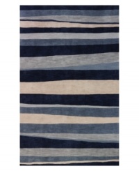 A bold, striped pattern fashioned in rich shades of blue and beige creates a captivating look that integrates beautifully with any transitional or contemporary decor. Rife with lush texture and detail, this luxurious area rug from Dalyn is beautifully hand tufted in polyester and acrylic, ensuring superior color retention and long-lasting wear. A bold, striped pattern fashioned in rich shades of blue and beige creates a captivating look that integrates beautifully with any transitional or contemporary decor. Rife with lush texture and detail, this luxurious area rug from Dalyn is beautifully hand tufted in polyester and acrylic, ensuring superior color retention and long-lasting wear.