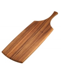 Showcase a variety of cheeses and charcuterie or a pile of subs on a paddle of richly colored acacia wood. With an integrated handle, the Classic Fjord server from Dansk shuttles all your favorite party foods out of the kitchen and onto your table. Showcase a variety of cheeses and charcuterie or a pile of subs on a paddle of richly colored acacia wood. With an integrated handle, the Classic Fjord server from Dansk shuttles all your favorite party foods out of the kitchen and onto your table.