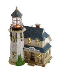 Full of New England charm and small town simplicity, the Dunes Edge Lighthouse becomes a focal point of your village-scape. Intricate details, like a wrap-around porch, towering lighthouse with trestles and bright windows, bring new life to your favorite holiday display. Full of New England charm and small town simplicity, the Dunes Edge Lighthouse becomes a focal point of your village-scape. Intricate details, like a wrap-around porch, towering lighthouse with trestles and bright windows, bring new life to your favorite holiday display.