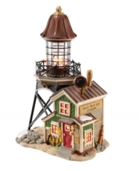 Escape to the seaside. A charming addition to your village-scape, the Sandy Shoal Lighthouse features stunning detailing, like an old-time outpost with bright windows and springtime flowers, a life-like lighthouse with tin-colored roofing and intricate trestles and sandy surroundings complete with rocky accents. Escape to the seaside. A charming addition to your village-scape, the Sandy Shoal Lighthouse features stunning detailing, like an old-time outpost with bright windows and springtime flowers, a life-like lighthouse with tin-colored roofing and intricate trestles and sandy surroundings complete with rocky accents.