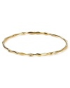 Simply elegant: this Nadri bangle features a subtly twisted silhouette and delicate cubic zirconia stations.