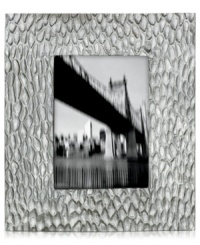 A matte, organic texture lends chic distinction to handcrafted Devore picture frames, featuring the distinct aesthetic of Donna Karan by Lenox. With a bronze or silver cast and fine wooden back. A matte, organic texture lends chic distinction to handcrafted Devore picture frames, featuring the distinct aesthetic of Donna Karan by Lenox. With a bronze or silver cast and fine wooden back.