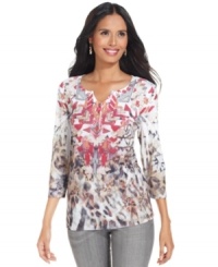 Style&co. is where the Southwest meets the savannahs: bold tribal patterns and animal prints combine to make one eye-catching henley! Style&co. is where the Southwest meets the savannahs: bold tribal patterns and animal prints combine to make one eye-catching henley!