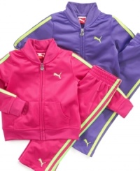 What a sport. She'll be ready and raring to go in this fun jacket and pant set from Puma. What a sport. She'll be ready and raring to go in this fun jacket and pant set from Puma.