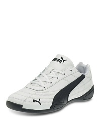 A solid, sophisticated sneaker from Puma that balances strong looks with a good fit and a slim look for fast-track kids. A solid, sophisticated sneaker from Puma that balances strong looks with a good fit and a slim look for fast-track kids.