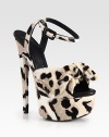 Trend-worthy design of lush calf hair with a daring leopard print and big bow, lifted by an ultra-high heel and platform. Self-covered heel, 6½ (165mm)Covered platform, 2¼ (60mm)Compares to a 4¼ heel (110mm)Leopard print calf hair upperAdjustable ankle strapLeather liningLeather and rubber solePadded insoleMade in Italy