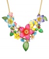 Come up for fresh air. Infuse your look with spring in Betsey Johnson's statement necklace. Clusters of enamel flowers, leaves, and ladybugs adorn this not-so-subtle style. Crafted in gold-plated mixed metal with sparkling crystal accents. Approximate length: 15 inches + 3-inch extender. Approximate drop: 2-3/4 inches.