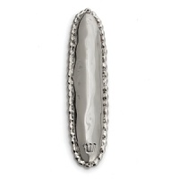 This eye-catching mezuzah is both traditional and modern with a style described by Aram as streamlined, timeless shapes... objects which reverberate with the skill of their maker and yet do not fit into a traditional interpretation of craft. The pieces possess a soulfulness and organic energy only possible through the handmade process. This eye-catching mezuzah is both traditional and modern with a style described by Aram as streamlined, timeless shapes... objects which reverberate with the skill of their maker and yet do not fit into a traditional interpretation of craft. The pieces possess a soulfulness and organic energy only possible through the handmade process.
