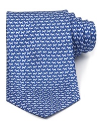A pack of jaunty schnauzers patterns this luxurious silk tie, rendered in a classic silhouette for traditional appeal. A pack of jaunty schnauzers patterns this luxurious silk tie, rendered in a classic silhouette for traditional appeal.
