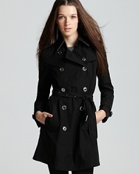 No matter where your travels take you, you're voyage chic with Burberry Brit's packable rainwear trench. No matter where your travels take you, you're voyage chic with Burberry Brit's packable rainwear trench.