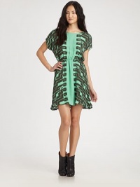 A chic crossover back and lower cut-out update this easy printed silk shift.BoatneckDropped shouldersShort sleevesElastic waistbandRuffled hemAbout 33 from shoulder to hemSilkDry cleanImportedModel shown is 5'10 (177cm) wearing US size Small. A chic crossover back and lower cut-out update this easy printed silk shift.BoatneckDropped shouldersShort sleevesElastic waistbandRuffled hemAbout 33 from shoulder to hemSilkDry cleanImportedModel shown is 5'10 (177cm) wearing US size Small.