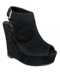 A suede finish on the Nancy shooties by Paris Hilton makes them luxe, while the decorative pompom on the side makes them fun. A suede finish on the Nancy shooties by Paris Hilton makes them luxe, while the decorative pompom on the side makes them fun.