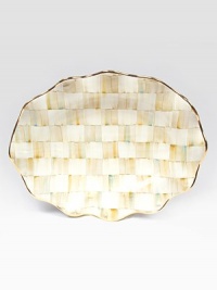 This remarkably unique platter, in hand-painted terra cotta with color-dragged checks and golden trim, creates an ultra-glamorous presentation piece for your guests.Ceramic with golden lustre16 X 22Hand washMade in the USA This remarkably unique platter, in hand-painted terra cotta with color-dragged checks and golden trim, creates an ultra-glamorous presentation piece for your guests.Ceramic with golden lustre16 X 22Hand washMade in the USA