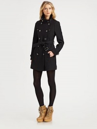 A traditional trench look in a cashmere-softened wool blend, modernized with bold touches of shine A traditional trench look in a cashmere-softened wool blend, modernized with bold touches of shine