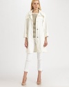 A fashion-forward collar flawlessly unites with classic trenchcoat details, including a waist-defining self belt.Oversized, fold-over collarGunflapsSnap closureFront zipperSelf-tie beltZipper pocketsRainflapAbout 37 from shoulder to hem74% linen/26% polyurethaneMachine washImported of Italian fabric Model shown is 5'11 (180cm) wearing US size Small. 