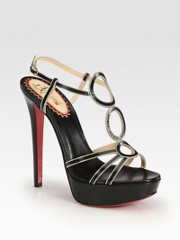 Tall platform silhouette of fine leather with chain detailing for a chic look. Self-covered heel, 5½ (140mm)Covered platform, 1½ (40mm)Compares to a 4 heel (100mm)Leather and chain upperAdjustable ankle strapLeather liningSignature red leather solePadded insoleMade in Italy Tall platform silhouette of fine leather with chain detailing for a chic look. Self-covered heel, 5½ (140mm)Covered platform, 1½ (40mm)Compares to a 4 heel (100mm)Leather and chain upperAdjustable ankle strapLeather liningSignature red leather solePadded insoleMade in Italy