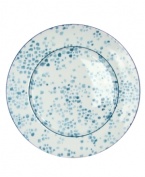 Offset the fanciful nature scene of Lulu Byzantine dinnerware with this confetti-patterned charger, crafted of durable white porcelain by Zrike.